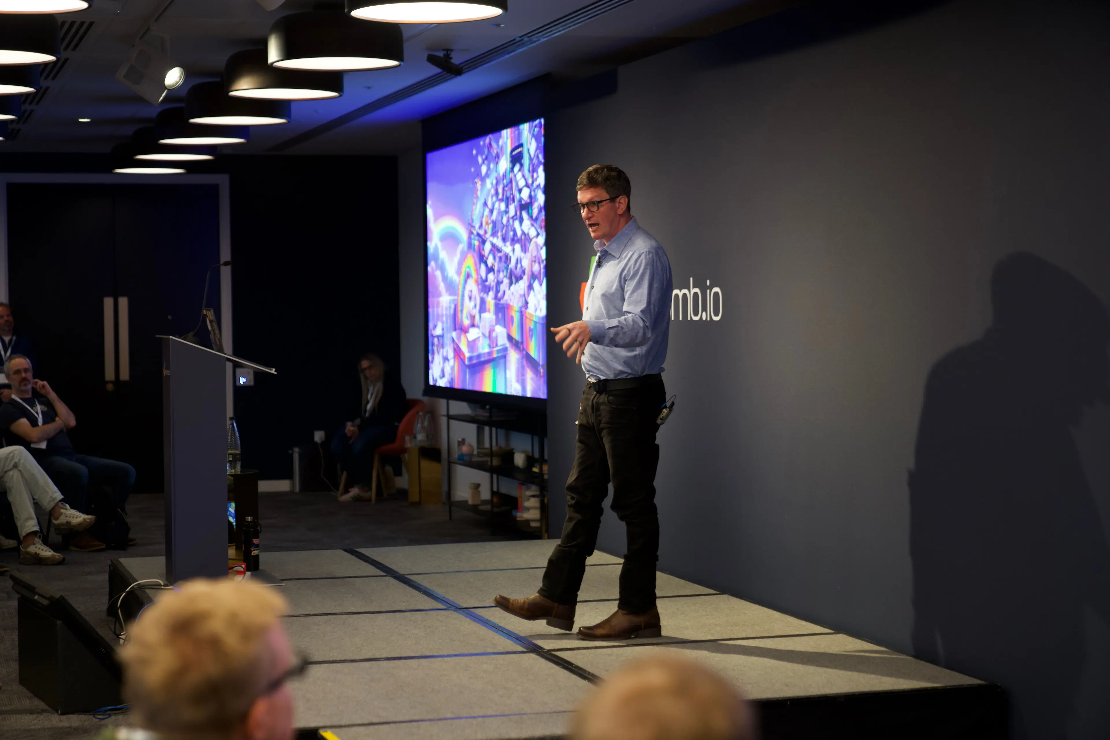 Corey Quinn presenting at O11yDay London 2026