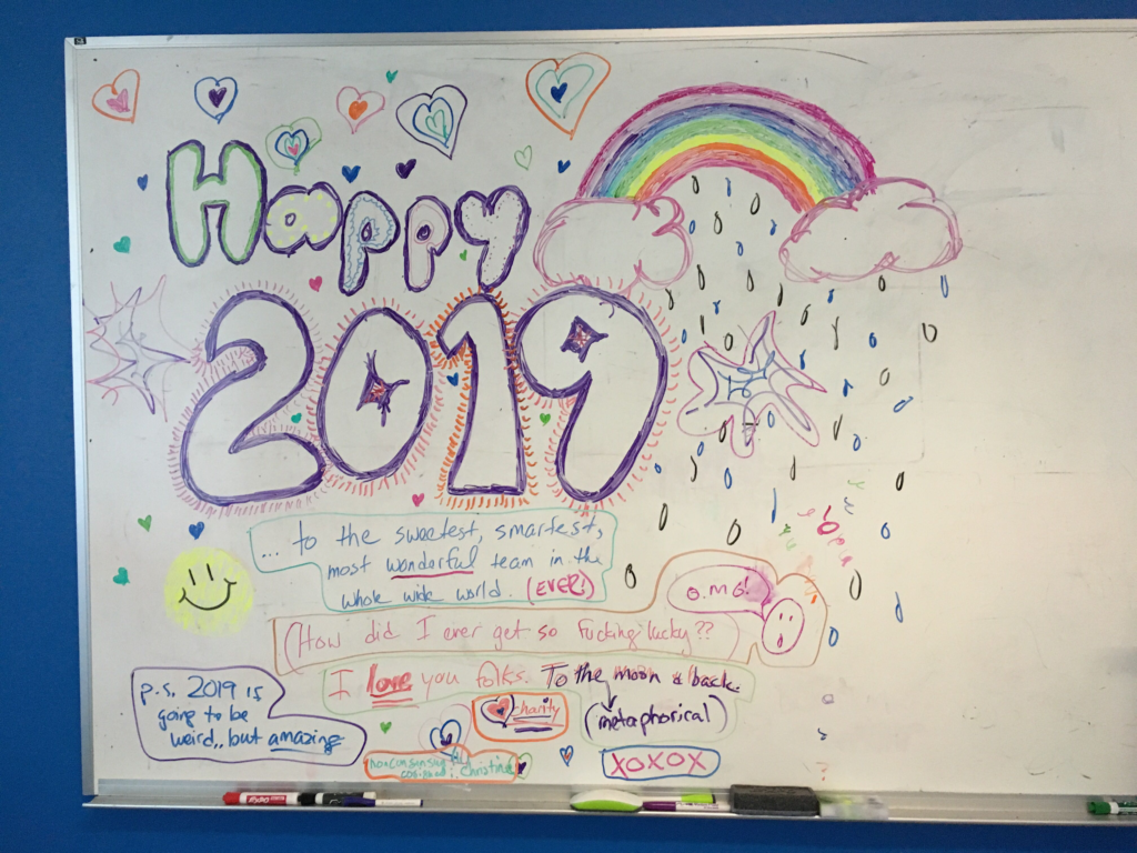 whiteboard art with rainbows